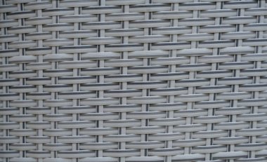 Siyah yapay rattan desenli. Sepet yapısının arka planı, yakın plan. Mobilya arkaplanı