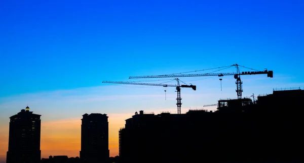 background of a construction site in qatar during sunset. construction site