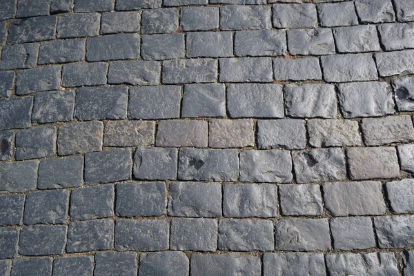 Pierres carrées de granit. Texture pavée de pierre. vue de dessus — Photo