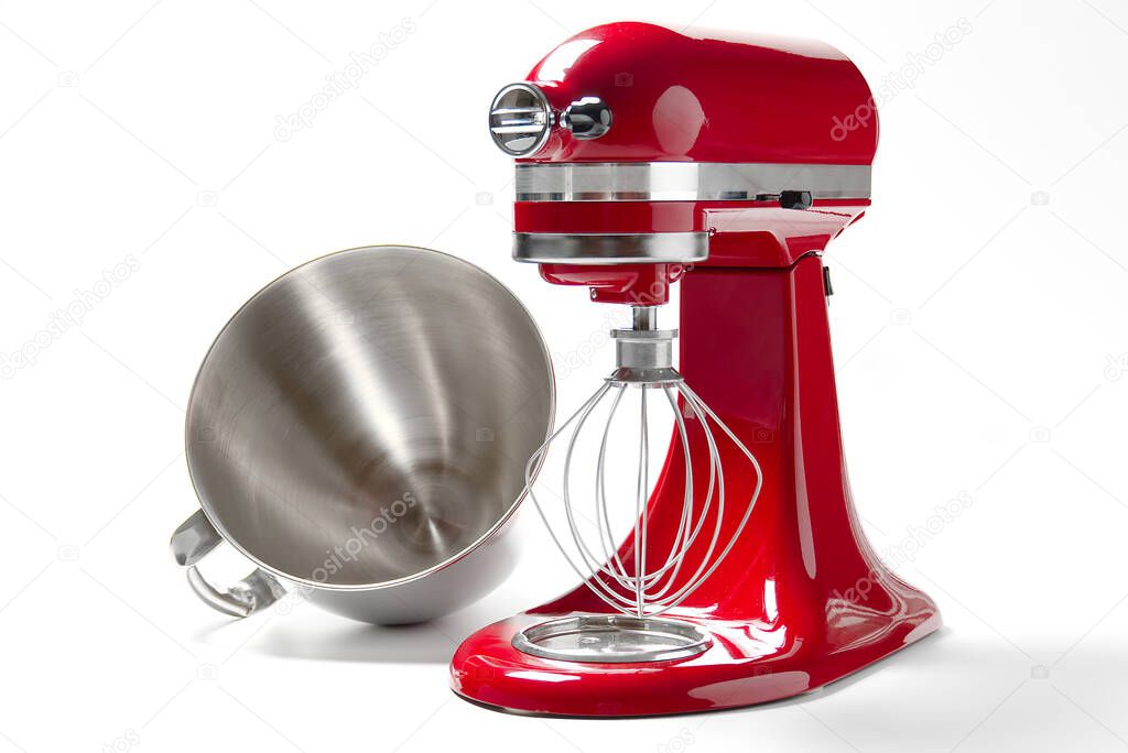 Stylish Red Kitchen Mixer With Clipping Path Isolated On White Background. Professional steel electric mixer with Metal Whisk