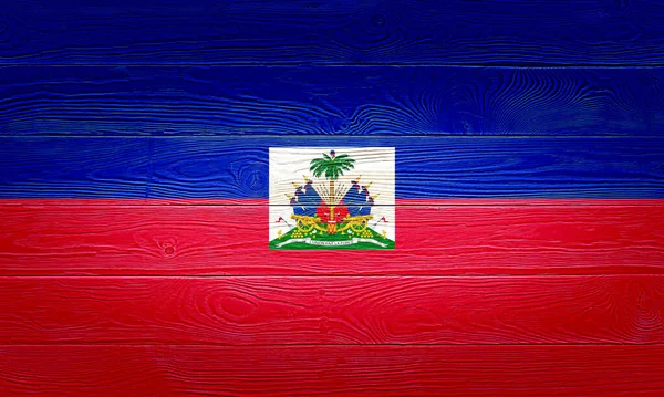 ハイチの旗は古い板の背景に描かれている。木の板の質感を磨きました。ハイチの木の質感の背景フラグ. — ストック写真