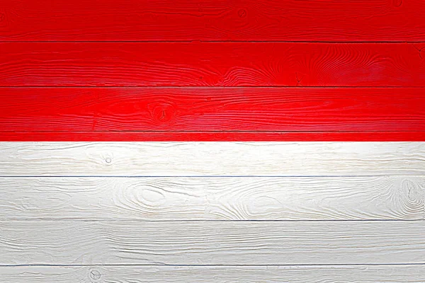 Indonéská vlajka namalované na staré dřevěné prkno pozadí. Kartáčované dřevěné desky textury. Dřevěné textury pozadí vlajka Indonésie. — Stock fotografie