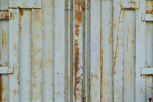 Ajtó egy acél szürke öreg rozsdás tengeri rakomány konténer, textúra, háttér. — Stock Fotó
