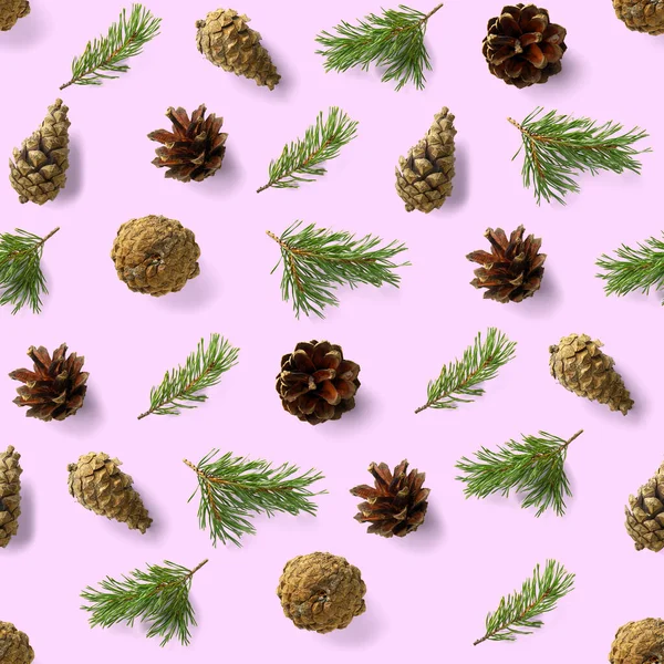 seamless christmas pattern from Pine cones, needles on pink background. modern pine cone christmas collage. Print for paper, fabric, wallpaper or background made frome pinecones.