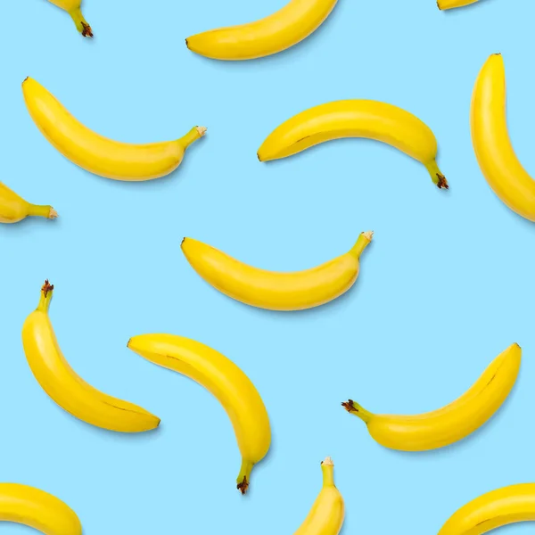 Bananas seamless pattern. pop art bananas pattern. Tropical abstract background with banana. Colorful fruit pattern of yellow banana on blue background, flat lay