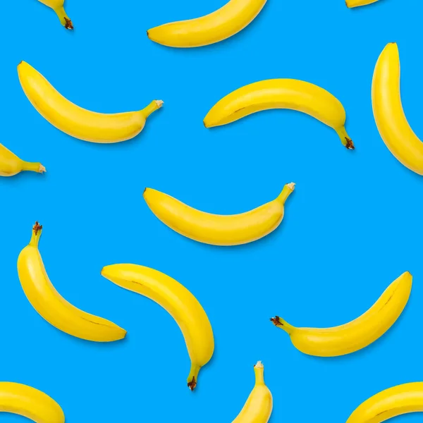 Bananas seamless pattern. pop art bananas pattern. Tropical abstract background with banana. Colorful fruit pattern of yellow banana on blue background, flat lay