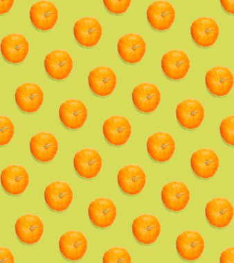 Balkabağıyla kusursuz desen. Balkabağı kalite desen. Yeşil arkaplanda kabaklardan yapılan sonbahar soyut ve pürüzsüz desen.