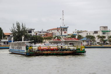 Ferry crossing between Itaja�� and Navegantes in Santa Catarina clipart