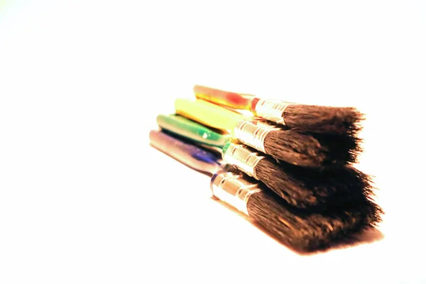 Multi Colored Brushes Black Pile Lie Table View White Background — Stock Photo, Image