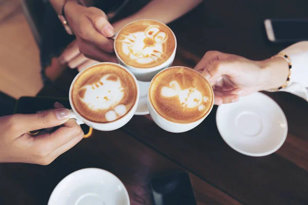 Group Friends Cheers Latae Cup Cafe Bar Phone Table Sitting — Stock Photo, Image