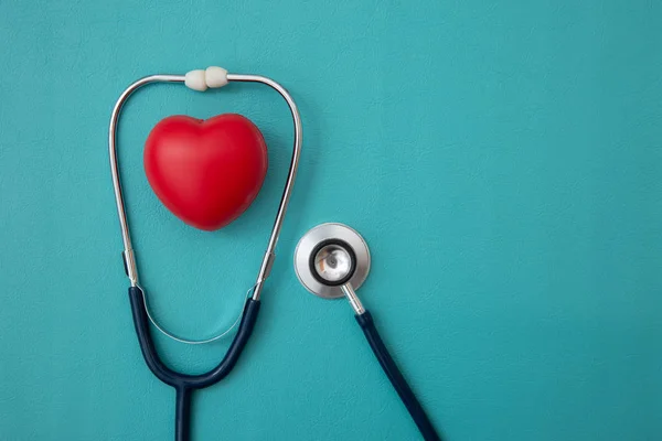 stethoscope and red heart Heart Check on blue blackground,Concep