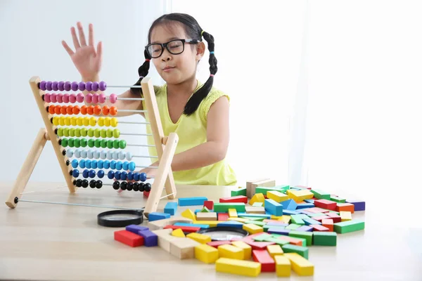 Brain development at  early childhood with the abacus.