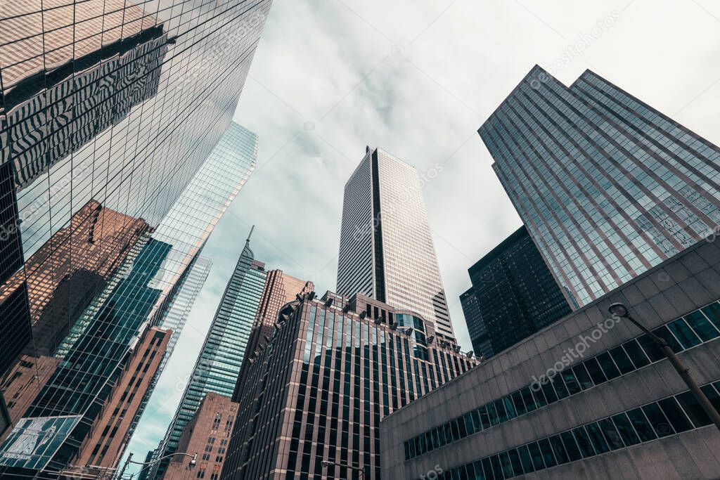 Office buildings tall up to the sky in the financial district in downtown Toronto Ontario Canada.