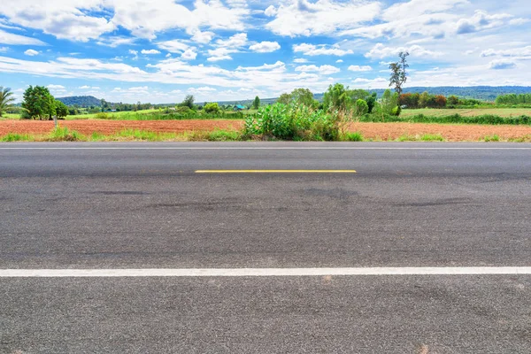 Asphalt road side view and landscape countryside.