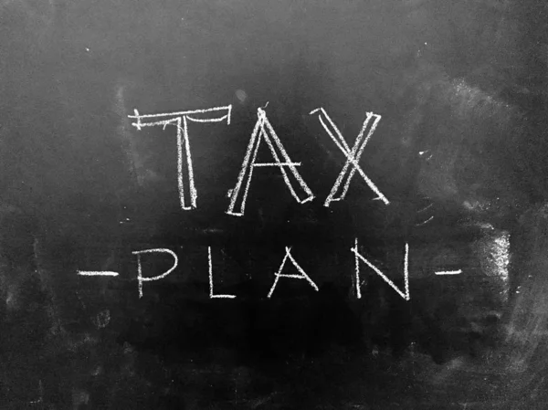 Plan de Impuestos Escrito a Mano en pizarra —  Fotos de Stock