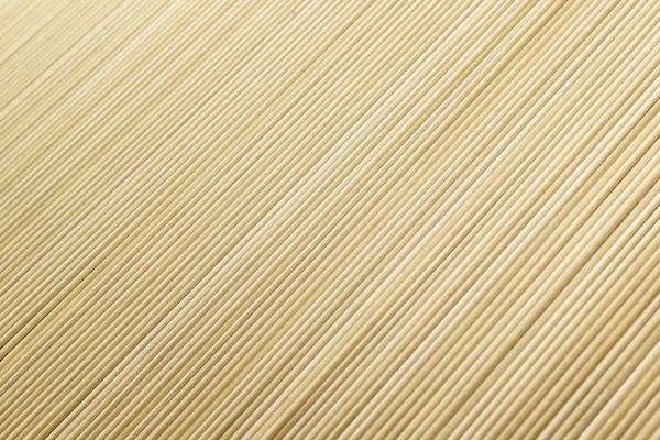 Thin noodle noodles on the floor background