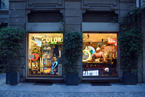 Milan, Italy, 08.04.2019: Storefront, entrance and displays of the Il Cirmolo vintage and modern antiques shop in the Brera Art District which is a romantic, artists' neighborhood