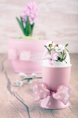 Easter composition with eggs and spring flowers