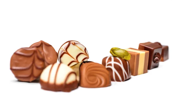 Chocolate pralines isolated on white — Stock Photo, Image