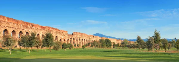 Ruins of the ancient aqueduct on Appia Way in Rome, Italy