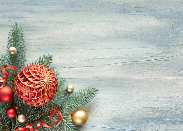 Christmas background: corner decorated with fir twigs and Christ