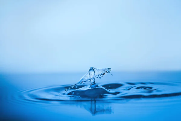 Water splash on surface, text space — Stock Photo, Image