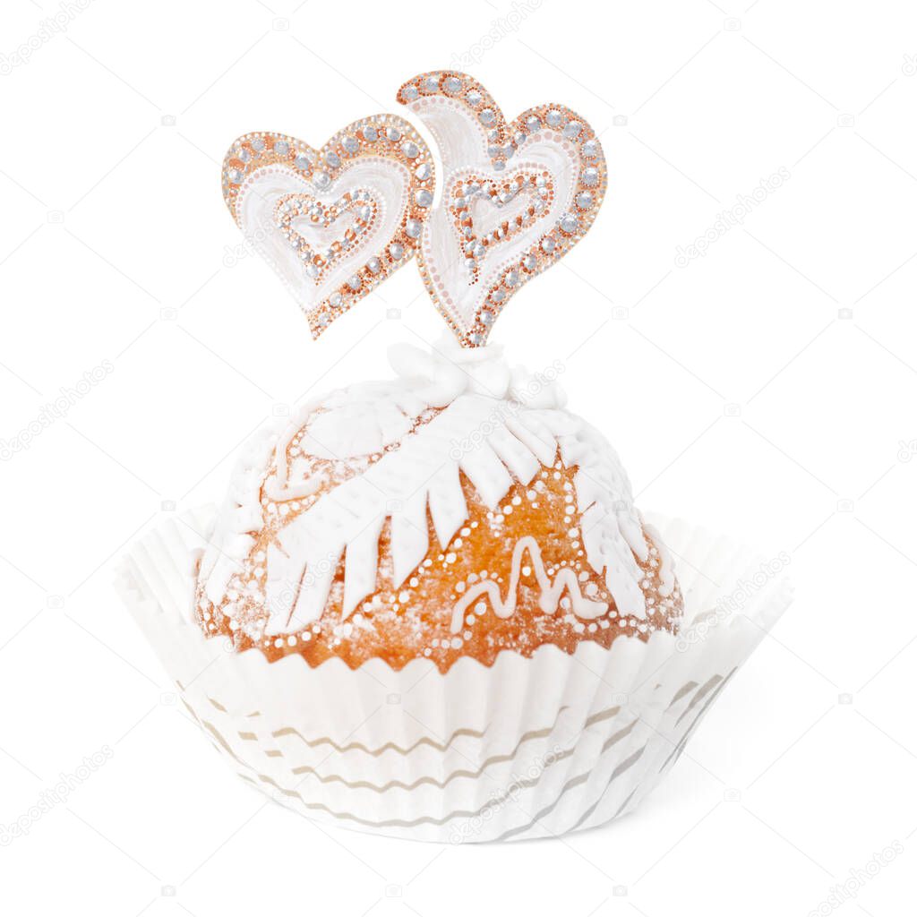 Cupcake decorated with white fondant and two hearts