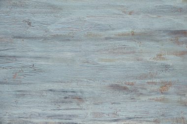 Açık gri-mavi ahşap desenli ve çatırdayan boyalı. Yaşlanmış grunge yüzeyi, kopyalama alanı ile yüksek çözünürlüklü resim