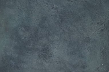 Koyu gri desenli arka plan, çatırdama etkisi var. Kopyalama alanı olan yüksek çözünürlüklü resim. Üst görünüm