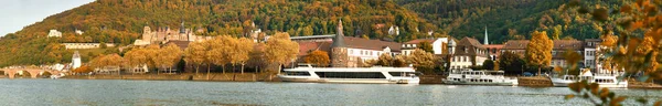 Panoramic view of Heidelberg and Neckar river in Autumn on a bright sunny day
