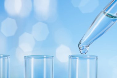 Laboratuvar cam eşyasıyla bilimsel arkaplan, metin alanı