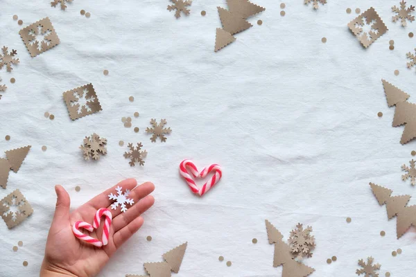 Natale Posa Piatta Vista Dall Alto Con Mano Femminile Tenuta — Foto Stock