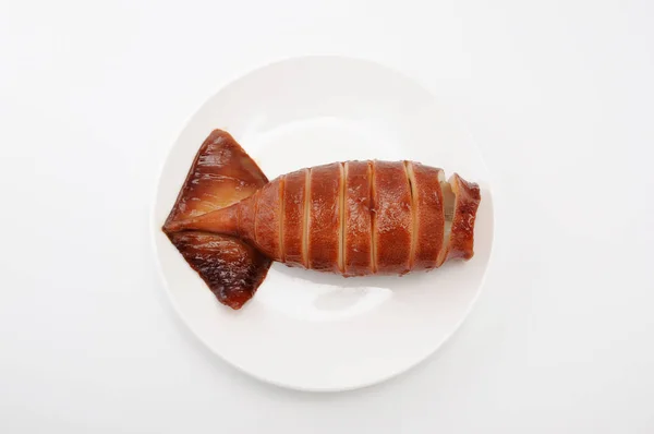 Calamar a la parrilla con salsa teriyaki en el plato sobre fondo blanco — Foto de Stock