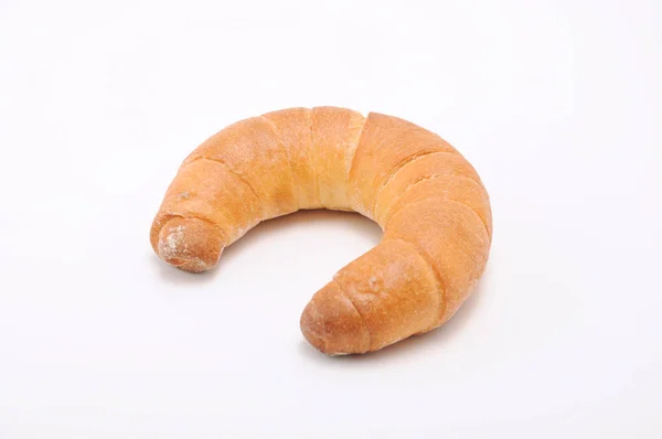 Beyaz arka plan üzerinde hilal rulo kruvasan fransız ekmeği — Stok fotoğraf