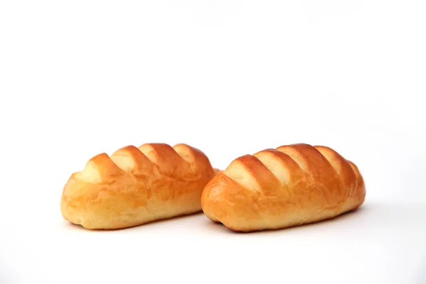 Rolo de pão de manteiga isolado no fundo branco — Fotografia de Stock