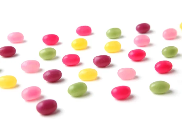 Färgglada Karameller Jelly Beans Sprids Vit Bakgrund — Stockfoto
