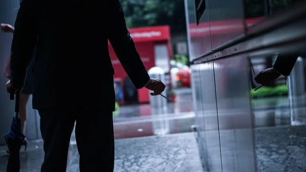 Businessman Smoking Stress Break Work Office Busy Raining City Background — Stock Photo, Image