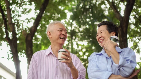 Happy Asian Elderly Couple Morning Walk Green City Drinking Coffee — Stock Photo, Image