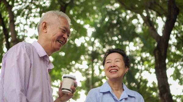 Happy Asian Elderly Couple Morning Walk Green City Drinking Coffee — Stock Photo, Image