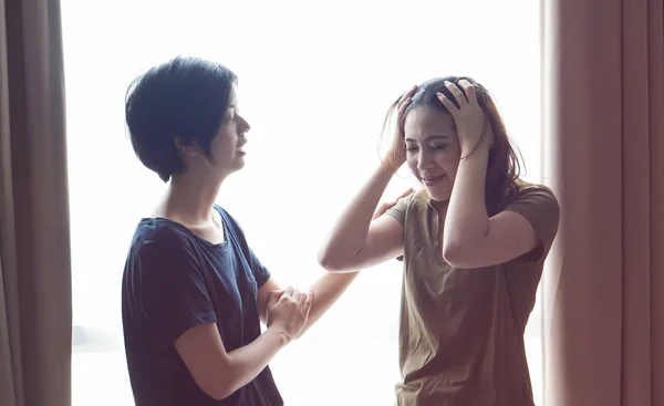 Asian woman friends stress on difficult situation, fighting problems