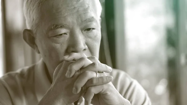 Asian senior man worry stress thinking about life — Stock Photo, Image
