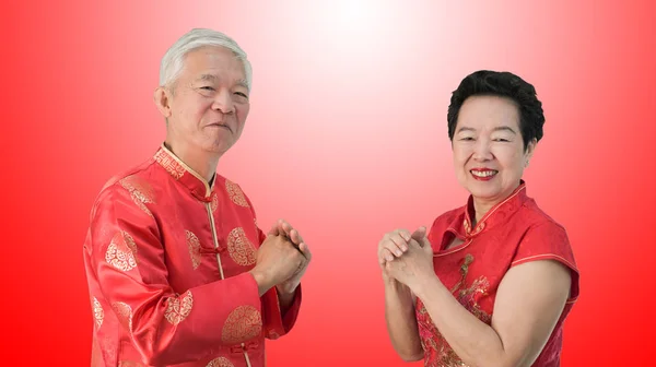 Asijské starší čínský Nový rok gesto oslavu šťastné — Stock fotografie