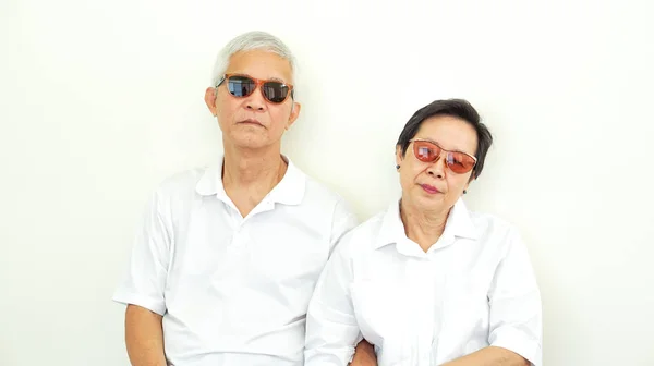 Asian senior couple unhappy angry deal with problem gesture expr