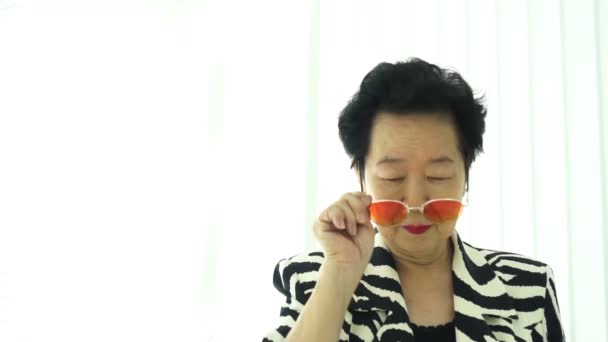 Asian Senior Elderly Model Stylish Fashion Summer Sunglasses Zebra Animal — Stock Video