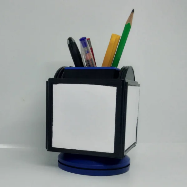 Plastic Pen Stand With Colourful pens, white background