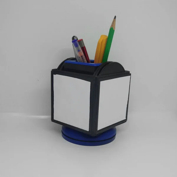 Plastic Pen Stand With Colourful pens, white background