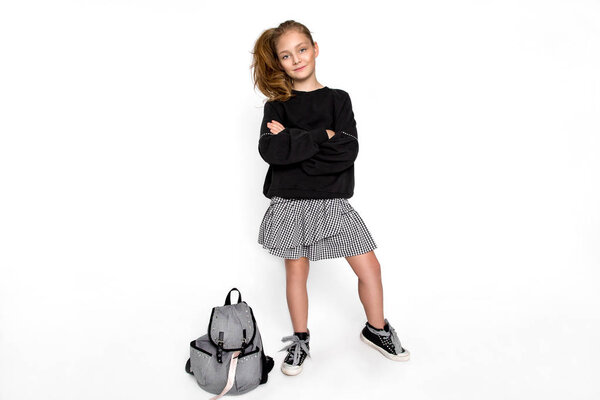 Back to school. Cute child girl with backpack running and going to school with fun - Image