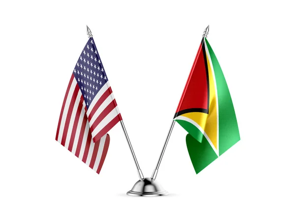 Schreibtischfahnen, vereinigte Staaten Amerika und Guyana, isoliert auf weißem Hintergrund. 3D-Bild — Stockfoto