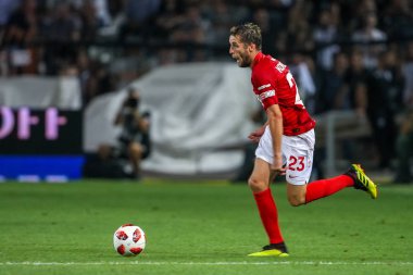 Thessaloniki, Yunanistan - 8 Ağustos 2018: Oyuncu, Spartak Dmitri Kombarov Uefa Şampiyonlar Ligi üçüncü, Paok rakip Spartak Moskova Toumba Stadyumu'nda arasında ön eleme turu sırasında eylem