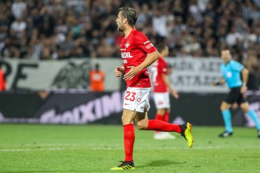 Thessaloniki, Yunanistan - 8 Ağustos 2018: Oyuncu, Spartak Dmitri Kombarov Uefa Şampiyonlar Ligi üçüncü, Paok rakip Spartak Moskova Toumba Stadyumu'nda arasında ön eleme turu sırasında eylem